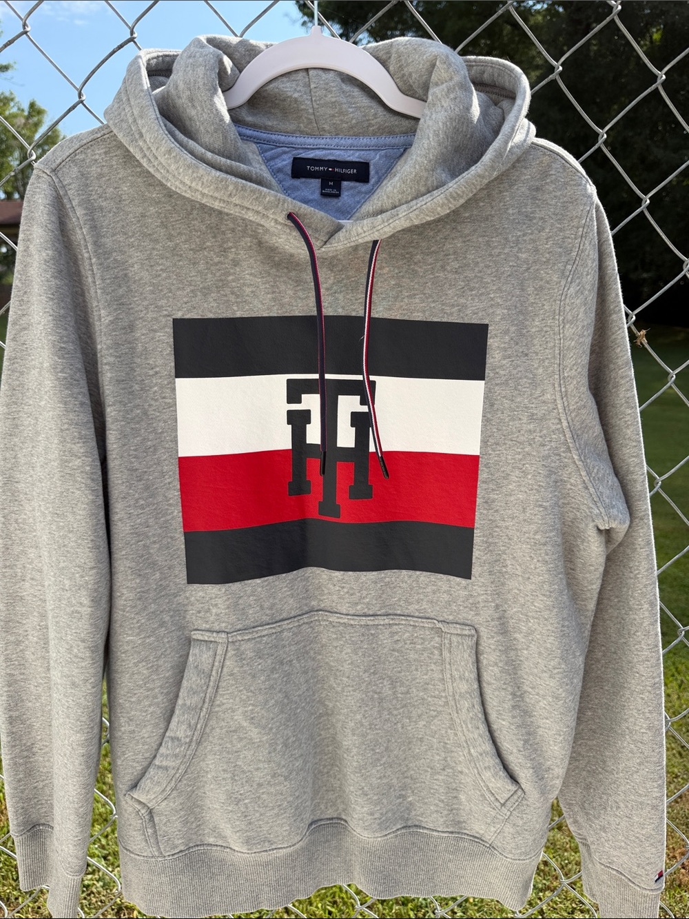 Tommy Hilfiger Gray Hoodie with Signature Red, Black & White Flag Graphic